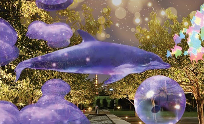 東京の人気おすすめイルミネーションスポット｜品川シーズンテラス / 品川イルミネーションの2023年特別企画「XR City」とのコラボレーションでXRスポットにてスマホをかざすと現れる幻想的な光を放つクジラ（東京・品川）